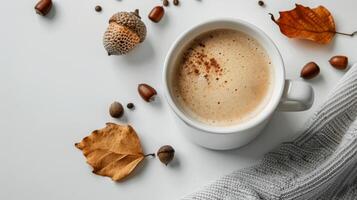 A Cup of Coffee Surrounded by Scattered Nuts photo