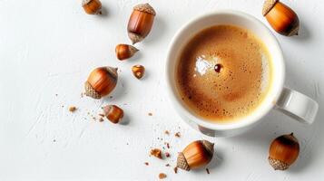 A Cup of Coffee Surrounded by Scattered Nuts photo