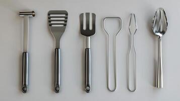 Group of Forks and Spoons Arranged Neatly photo