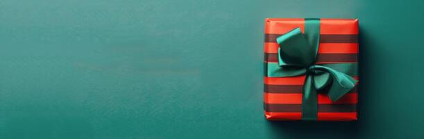 Red Gift Box With Green Ribbon photo