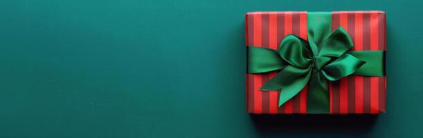 Red Gift Box With Green Ribbon photo