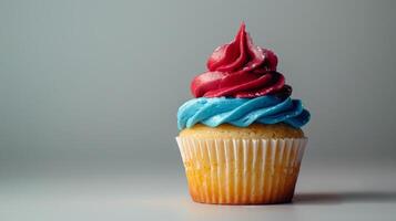Chocolate Cupcake With Blue and Pink Frosting photo