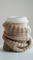 Cup of Coffee With Knitted Wrap photo