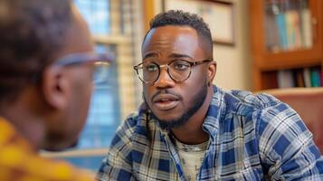 Two Men With Glasses Talking photo