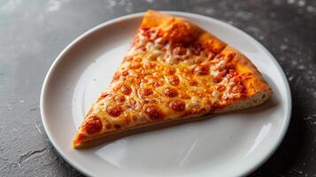 A Slice of Pepperoni Pizza on a White Plate photo