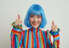 Woman With Blue Hair Giving a Thumbs Up photo