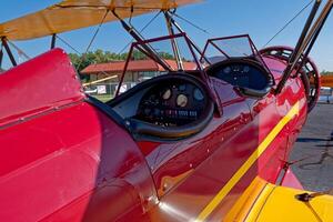 Opened cockpit on a biplane photo