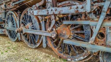 Steam locomotive rusty train wheels photo