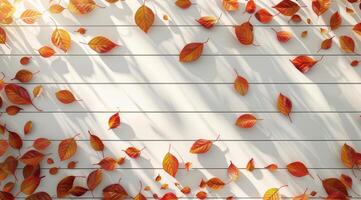 Group of Red and Orange Leaves on White Wooden Surface photo