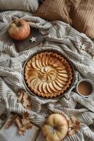 Pie on Bed Next to Coffee Cup photo