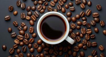 A Cup of Coffee Surrounded by Coffee Beans photo