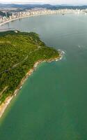 Balneario Camboriu in Santa Catarina. Taquaras Beach and Laranjeiras Beach in Balneario Camboriu. Aerial view in landscape. photo