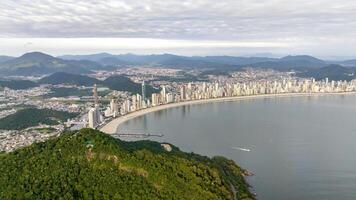 Balneario Camboriu in Santa Catarina. Taquaras Beach and Laranjeiras Beach in Balneario Camboriu. Aerial view in landscape. photo