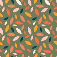 Autumn leaf fall on a green background. Seamless cute pattern with leaves or grains in different colors. vector