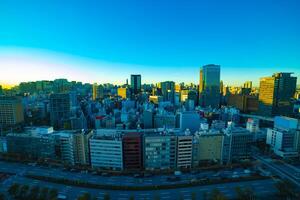 A dawn cityscape in Tokyo high angle wide shot photo