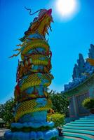 A big statue dragon at Suoi Tien park in Ho Chi Minh Vietnam wide shot photo