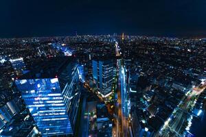 A night cityscape at the urban city in Tokyo wide shot high angle photo