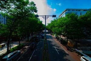 A cityscape at Omotesando avenue in Tokyo daytime wide shot photo
