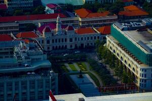 A traffic jam at Ho Chi Minh People's Committee Office Building high angle long shot photo