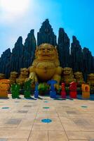 A Big Statue Guardian dog at Suoi Tien park in Ho Chi Minh wide shot photo