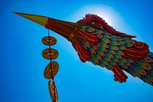 A big statue Phoenix at Suoi Tien park in Ho Chi Minh Vietnam low angle photo