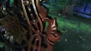 carvings on wood in brown color photo