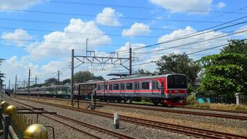 Commuter Line or electric train in Jakarta, Indonesia photo