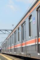 Commuter Line or electric train in Jakarta, Indonesia photo