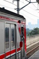 Commuter Line or electric train in Jakarta, Indonesia photo