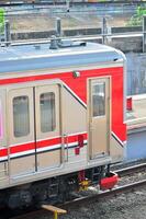 Commuter Line or electric train in Jakarta, Indonesia photo