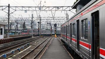 Commuter Line or electric train in Jakarta, Indonesia photo