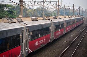 Commuter Line or electric train in Jakarta, Indonesia. photo