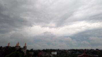 View of the sky with bright clouds on the lake photo