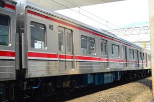 Commuter Line or electric train in Jakarta, Indonesia. photo