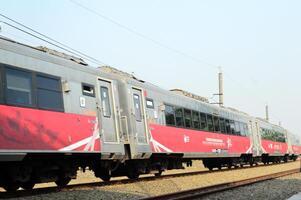 Commuter Line or electric train in Jakarta, Indonesia. photo