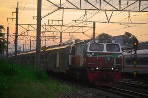 Commuter Line or electric train in Jakarta, Indonesia photo