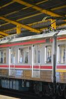 Commuter Line or electric train in Jakarta, Indonesia. photo