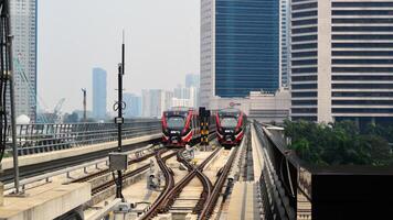 Commuter Line or electric train in Jakarta, Indonesia photo