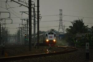 Commuter Line or electric train in Jakarta, Indonesia photo