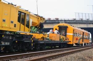 Commuter Line or electric train in Jakarta, Indonesia photo