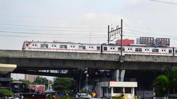 Commuter Line or electric train in Jakarta, Indonesia photo