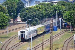 Commuter Line or electric train in Jakarta, Indonesia. photo