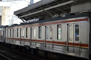 Commuter Line or electric train in Jakarta, Indonesia. photo