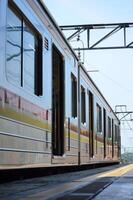 Commuter Line or electric train in Jakarta, Indonesia. photo