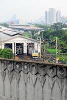 Commuter Line or electric train in Jakarta in train shed photo