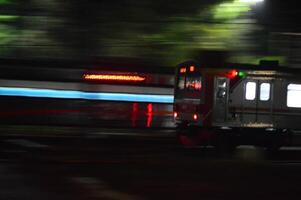 Commuter Line or electric train in Jakarta, Indonesia. photo