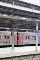 Commuter Line or electric train in Jakarta, Indonesia. photo