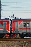 Commuter Line or electric train in Jakarta, Indonesia. photo