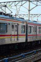 Commuter Line or electric train in Jakarta, Indonesia. photo