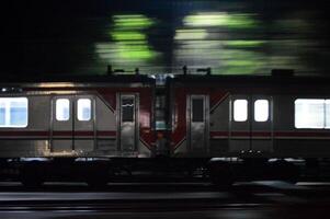 Commuter Line or electric train in Jakarta, Indonesia. photo